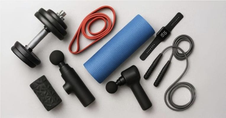 Fitness gear including dumbbells, yoga mat, resistance bands, and water bottle for home workout routine