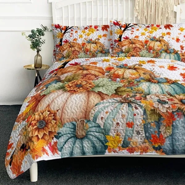 fall bedding set with pumpkin quilt on bed