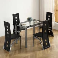 dining table with glass top and four chairs
